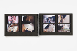 A spiral-bound book, The Dog's Bolex, opened to a black spread showing multiple small, rectangular film stills from Marcia Farquhar's performance, from a film by Tony Grisoni, featuring Farquhar interacting with a oversized wooden rocking horse.