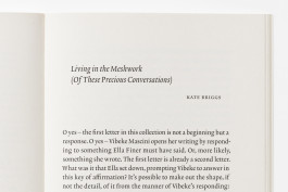 Close-up detail of an open book with a blank left page and an essay by Kate Briggs on the right page